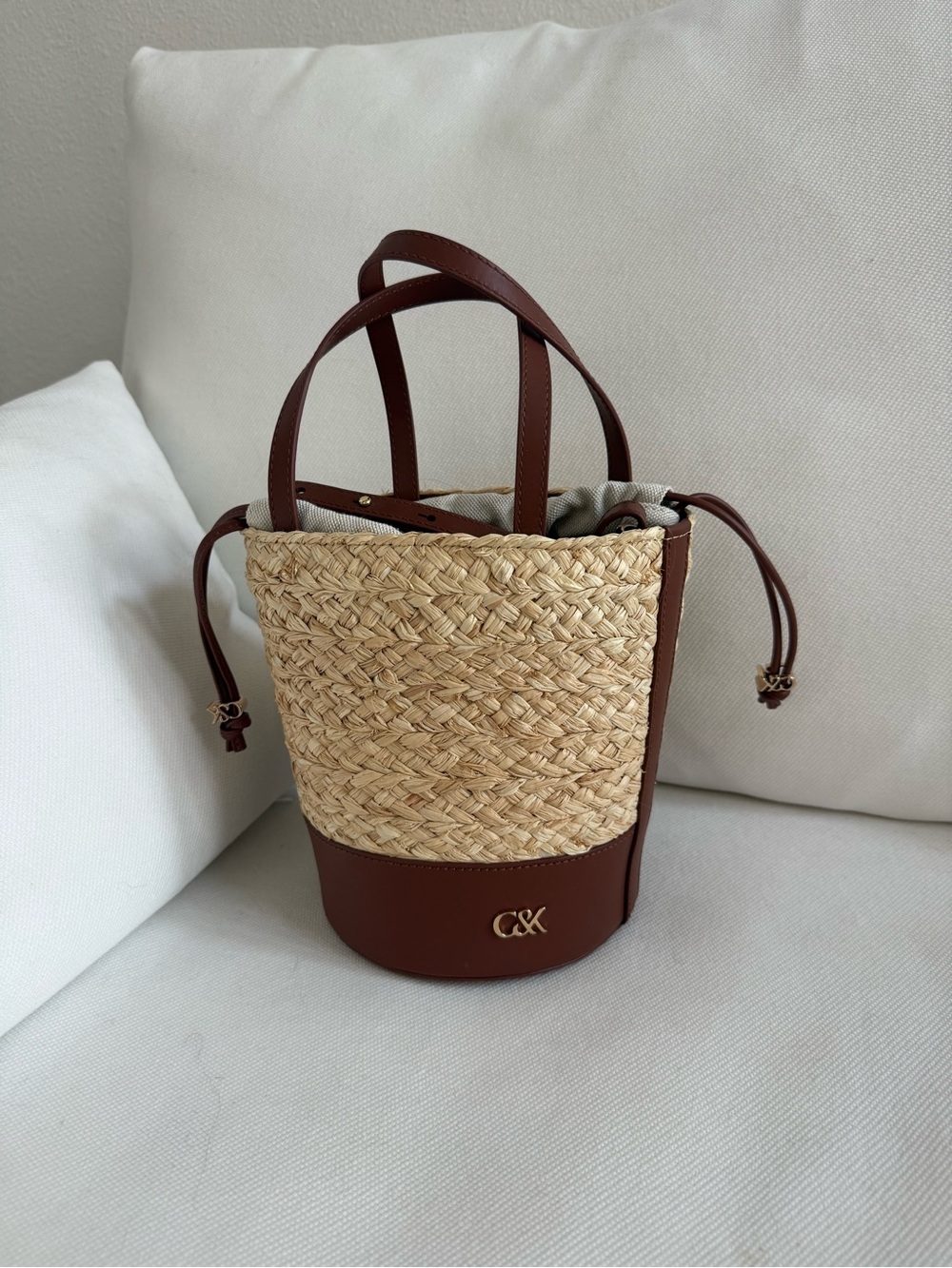 Charles & Keith Straw Mini Bucket Bag with Brown Trim